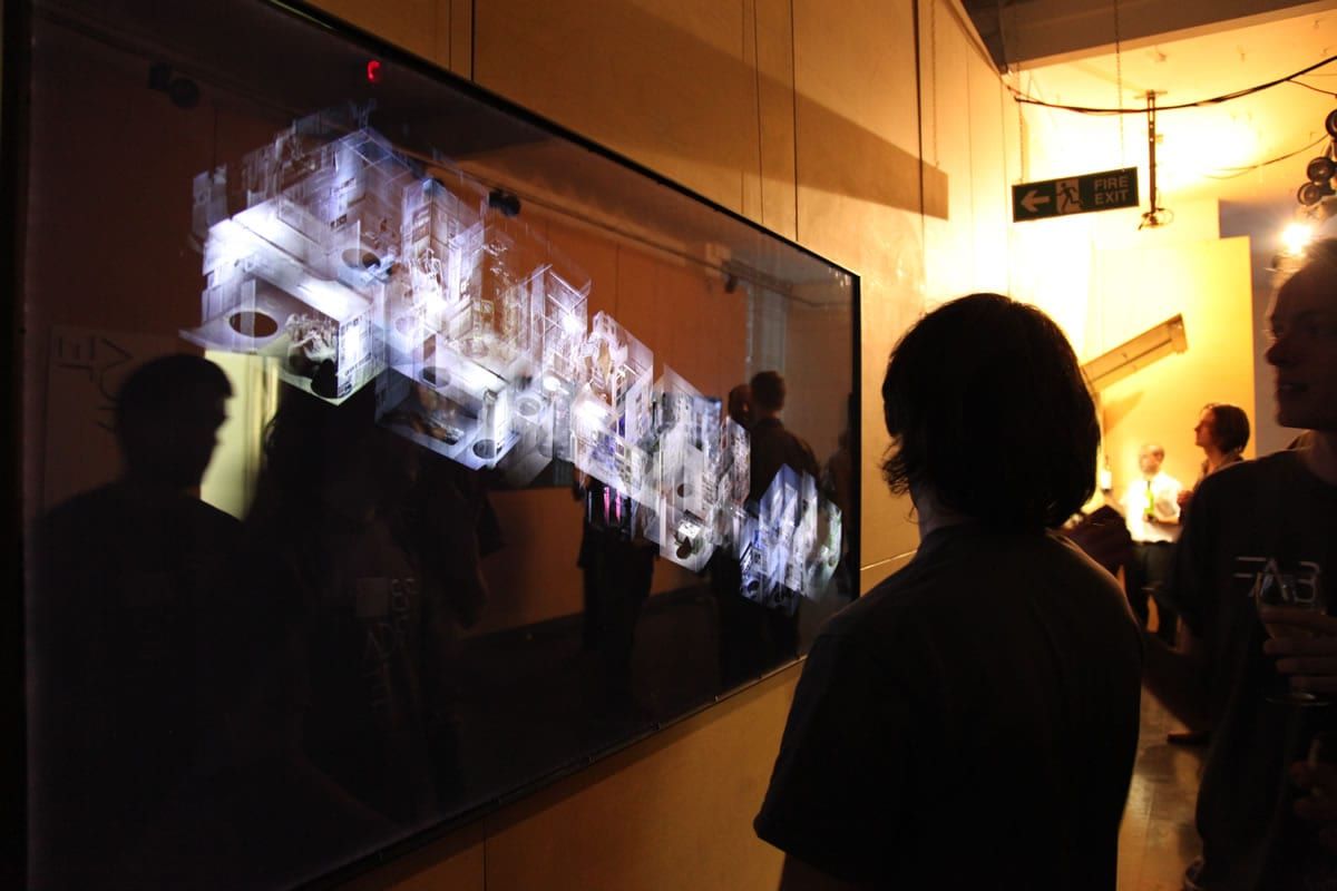 Visitor looking at an exhibit at FABRICATE 2011